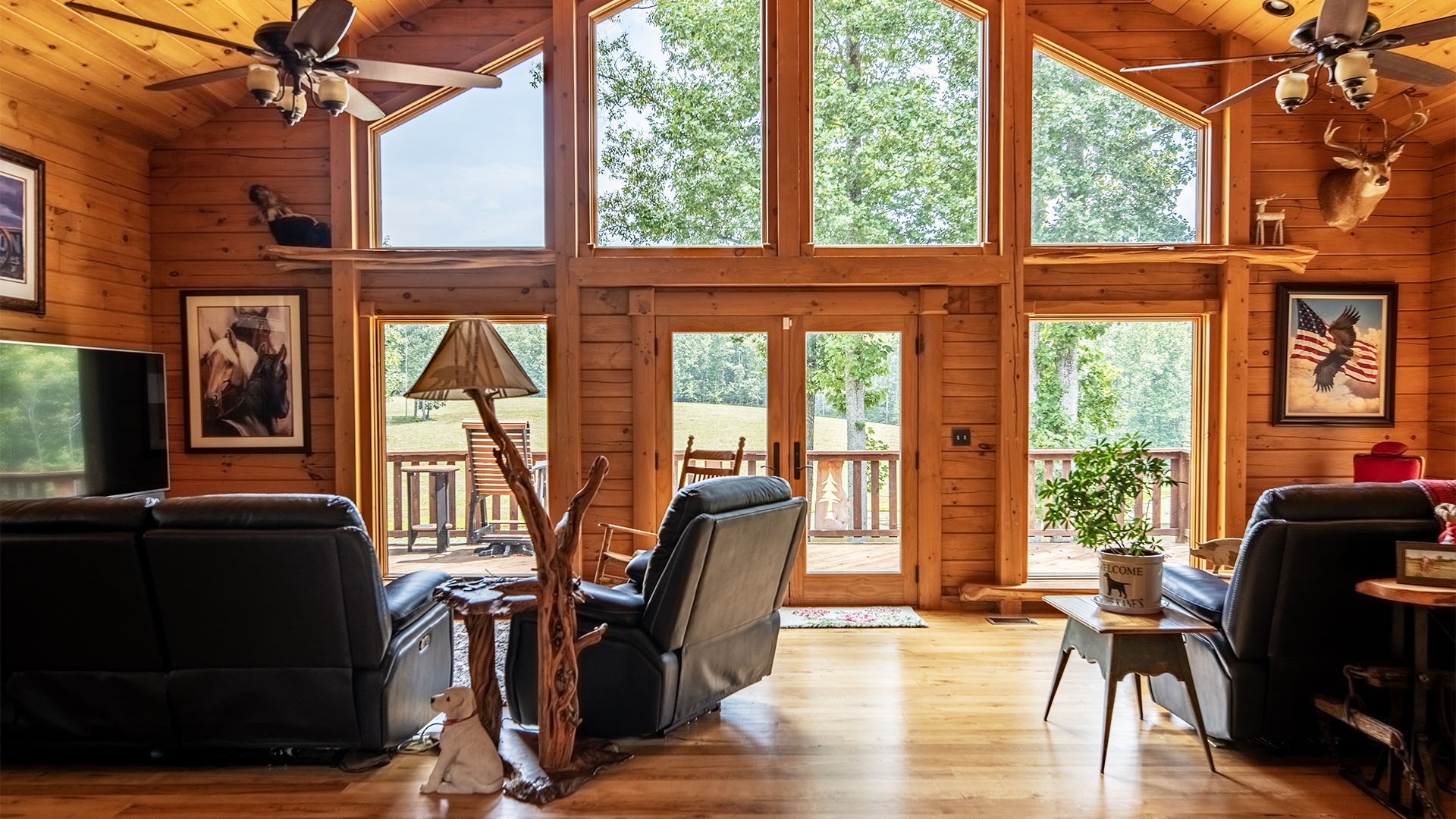 living room looking toward deck and pond at Virginia horse farm home