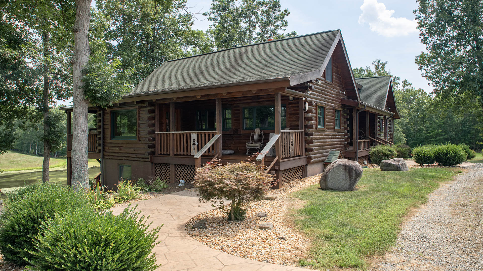 side porch of log home at Louisa County Virginia horse farm